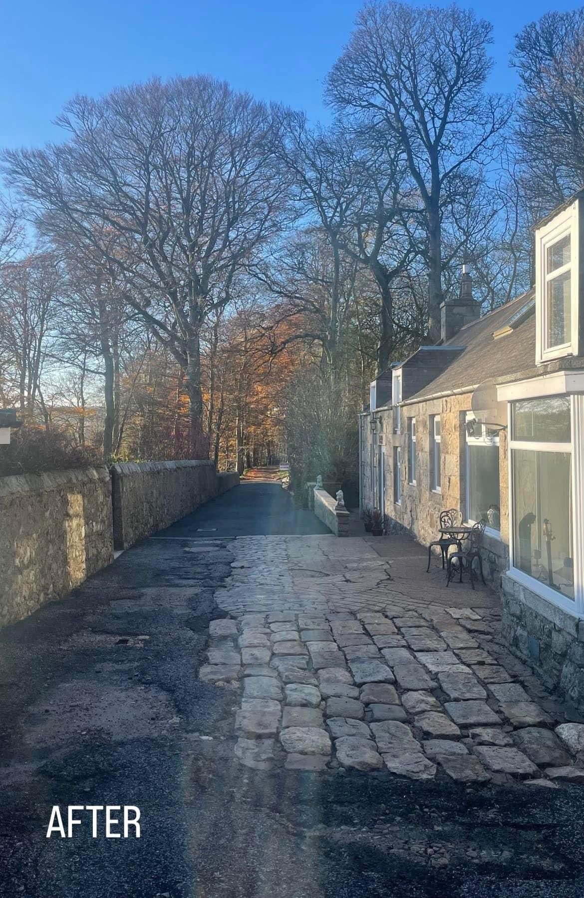 after photo of a large tarmac driveway after a clean