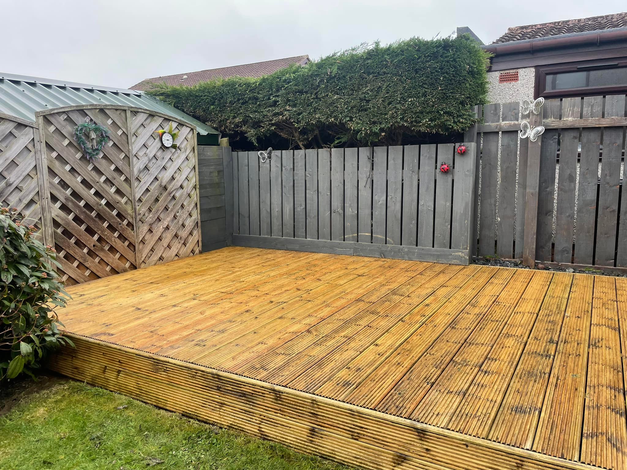 Cleaned timber decking with the green algae cleared off in Aberdeen