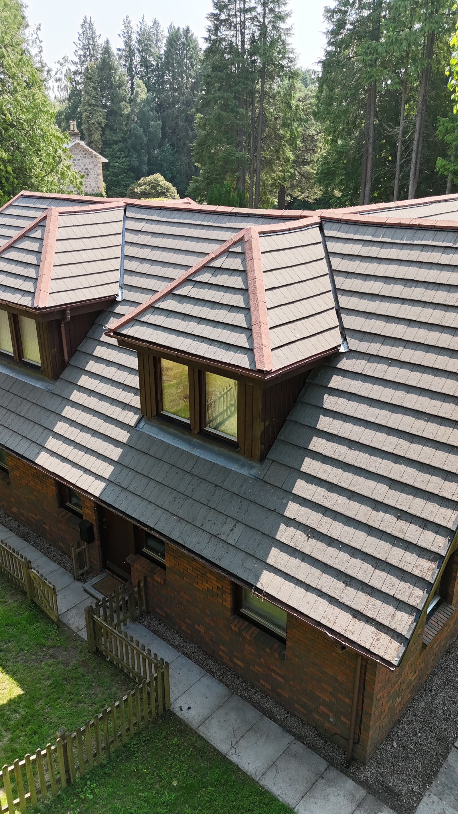 Close-up of Aberdeen roof tiles cleared of moss